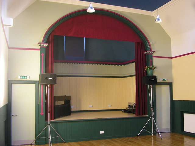The original stage features a seating gallery looking down on to the stage.