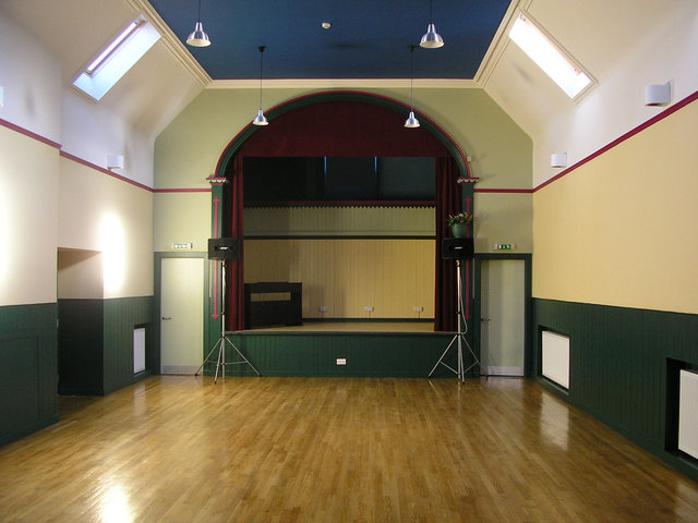 The newly refurbished main hall, featuring the original stage with gallery.